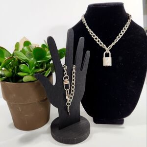 Louis Vuitton silver lock and key pendant and bracelet